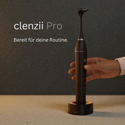 Clenzii Pro elektrische Zahnseide in Schwarz auf Ladestation im Badezimmer